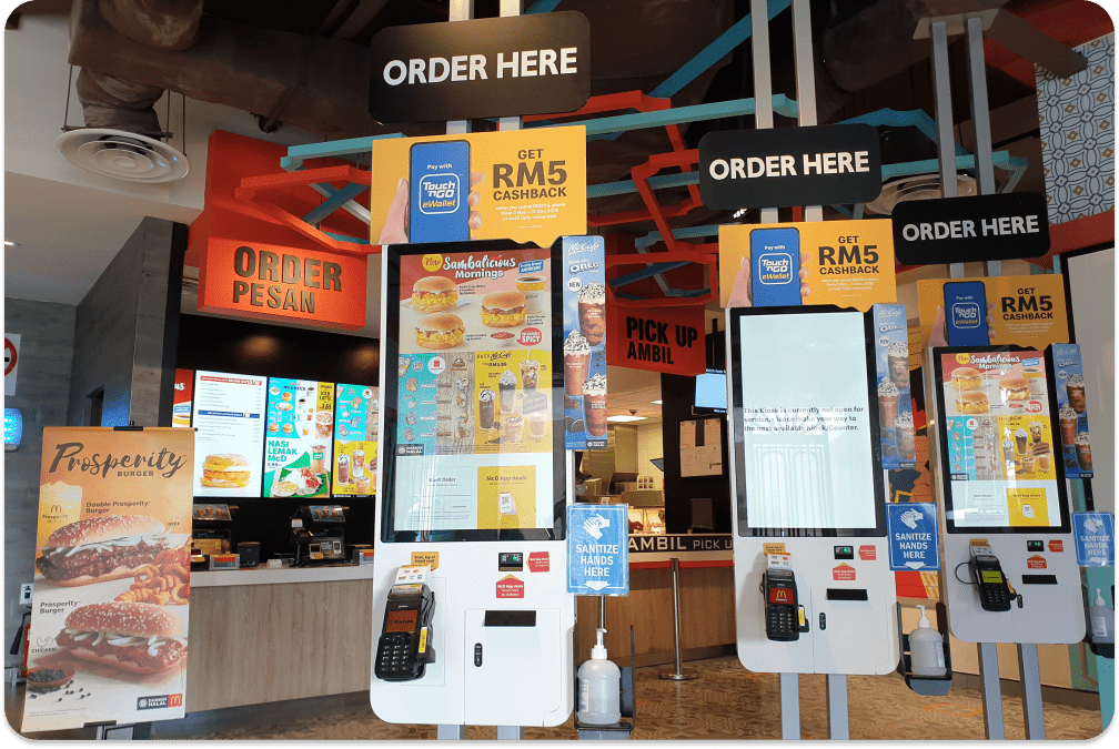 Customized kiosk interfaces showing a restaurant’s branding-min